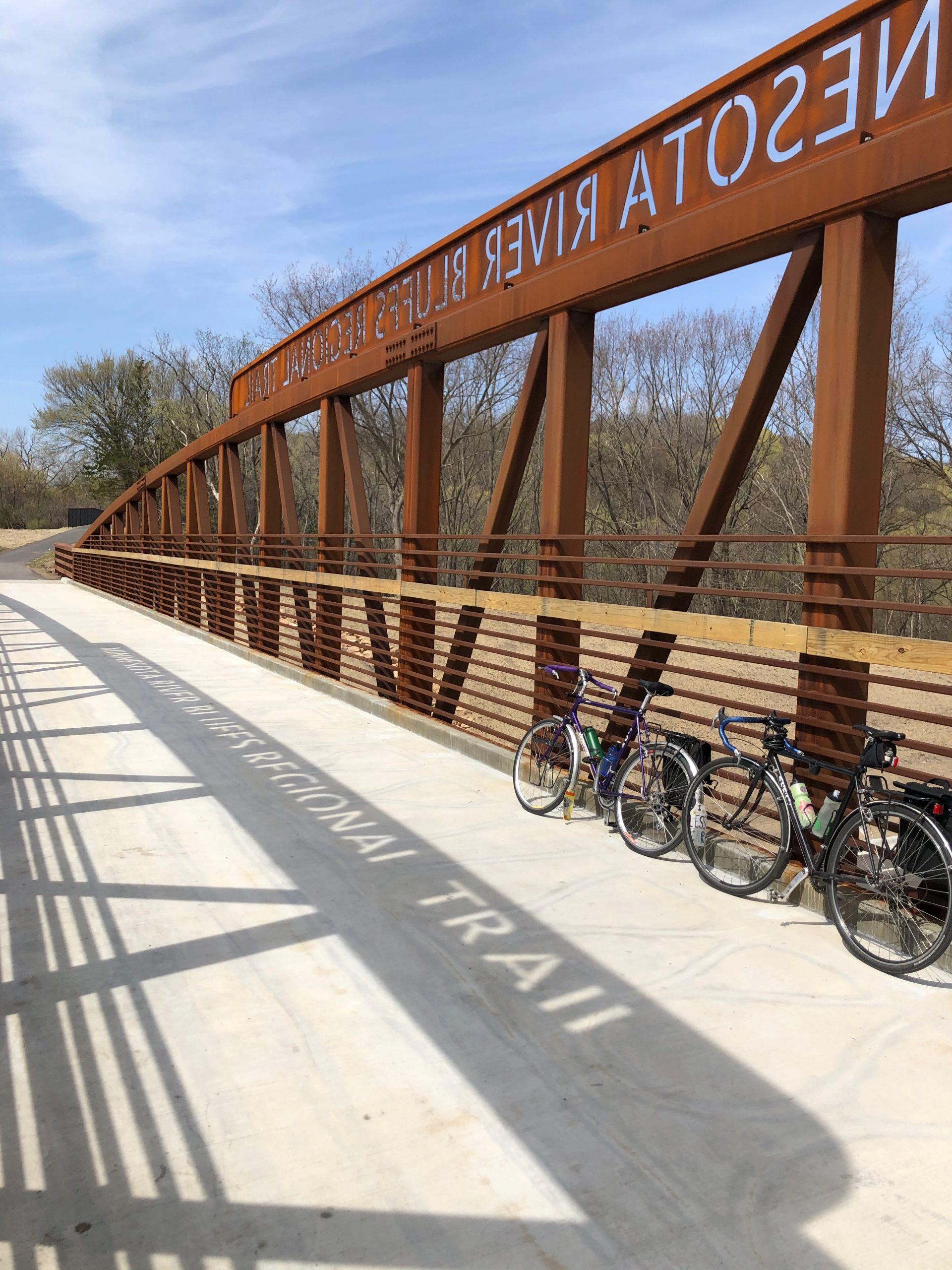 two bikes leaning against bridge in shakopee